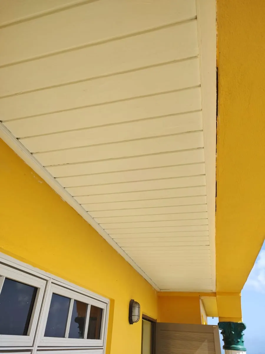 Restored eave with fresh finish